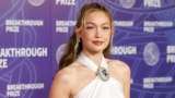 Gigi Hadid Makes a Chic Red Carpet Comeback in a Bridal-Inspired Halter Dress