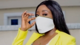 Ini Edo Steps Out In A Yellow Blazer And Mini White Dress Combo