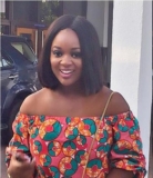 Jackie Appiah Opts For Sneakers And A Little Ankara Dress