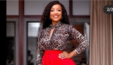Beaming Joselyn Dumas Looks Pretty In Animal Prints Blouse And Tiered Midi Skirt
