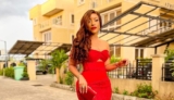 Joselyn Dumas is a Vision in a Shoulder-Baring Red Gown While Filming “Lekki Wives” Reunion