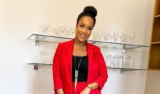 Joselyn Dumas Looks Polished in Red Pantsuit and Black Camisole