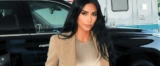 Kim Kardashian Drapes Herself in Head-to-Toe Gold Outfit For Her White House Visit
