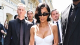Kim Kardashian’s All-White Look Includes a Halter Dress and Pantaleggings