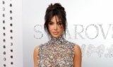 Kim Kardashian Goes Super Glam in a Dazzling Swarovski Chain Top and Skirt