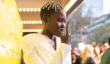 Lupita Nyong’o Wore A Gorgeous White Cut-Out Pantsuit For ‘Us’ Movie Premiere