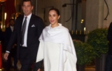 Meghan Markle Attends Paris Fashion Week in an All-White Look
