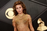 Miley Cyrus Went For Gold Sheer Dress As She Won the 2024 Grammys