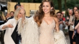 Miley Cyrus’ Netted Naked Dress Look Features a Dramatic Fringe Stole