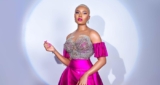 Nancy Isime Stuns in a Pink Slit Gown, Matching Shoes and Lips at the Voice Nigeria