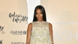 Naomi Campbell Drapes Herself In A White Hooded Gown At Dior Exhibition In Qatar