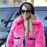 Mariah Carey Looks Pretty in a Pink Fur Jacket and Black Leggings