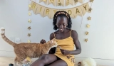 Lupita Nyong’o Threw Her Cat a Birthday Party as She Wore a Mustard Dress for the Occasion