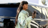 Rihanna Wears The Type Of Dress You’ll Want For Rainy Days