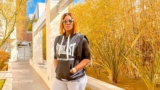 Stephanie Linus Poses in a Hooded Top, Wide-Leg Pants and Ankle Booties