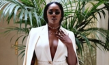 Tiwa Savage Wears Monochrome Pantsuit on the Street of Paris