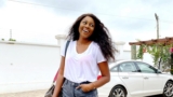 Yvonne Nelson Looks Chic in a Sweatshirt and Short Denim Pants